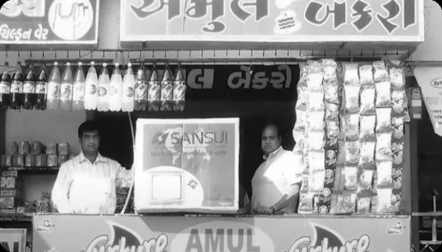 The original Atul Bakery counter in Surat, India, photographed in black and white