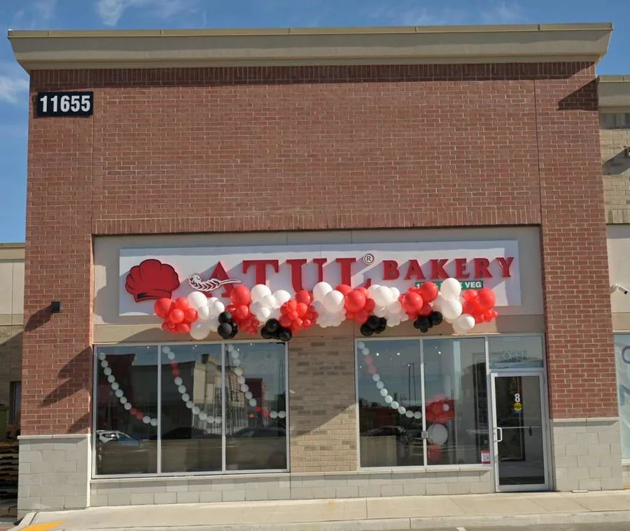 The Atul Bakery storefront in Brampton, Ontario, decorated with balloons on opening day